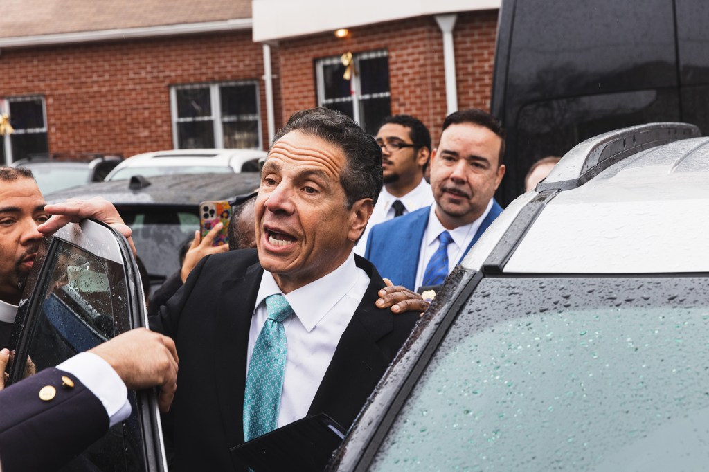 Former governor Andrew Cuomo departs an event with Ruben Diaz in The Bronx.