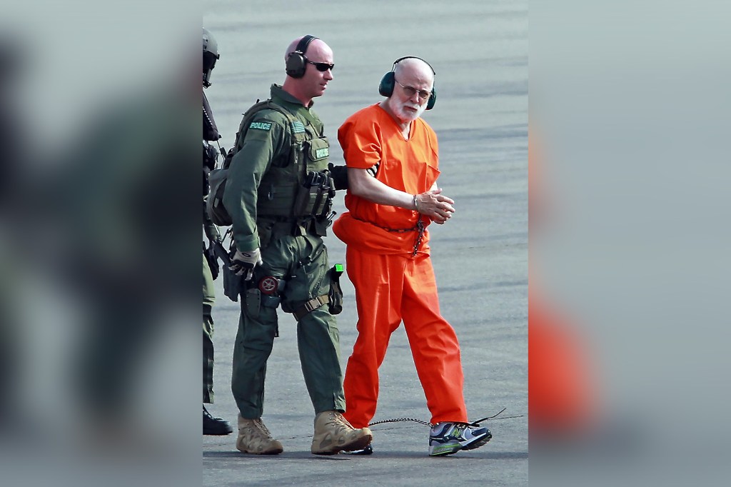 Whitey Bulger is taken from a Coast Guard helicopter to an awaiting Sherif vehicle after attending federal court on June 30, 2011.