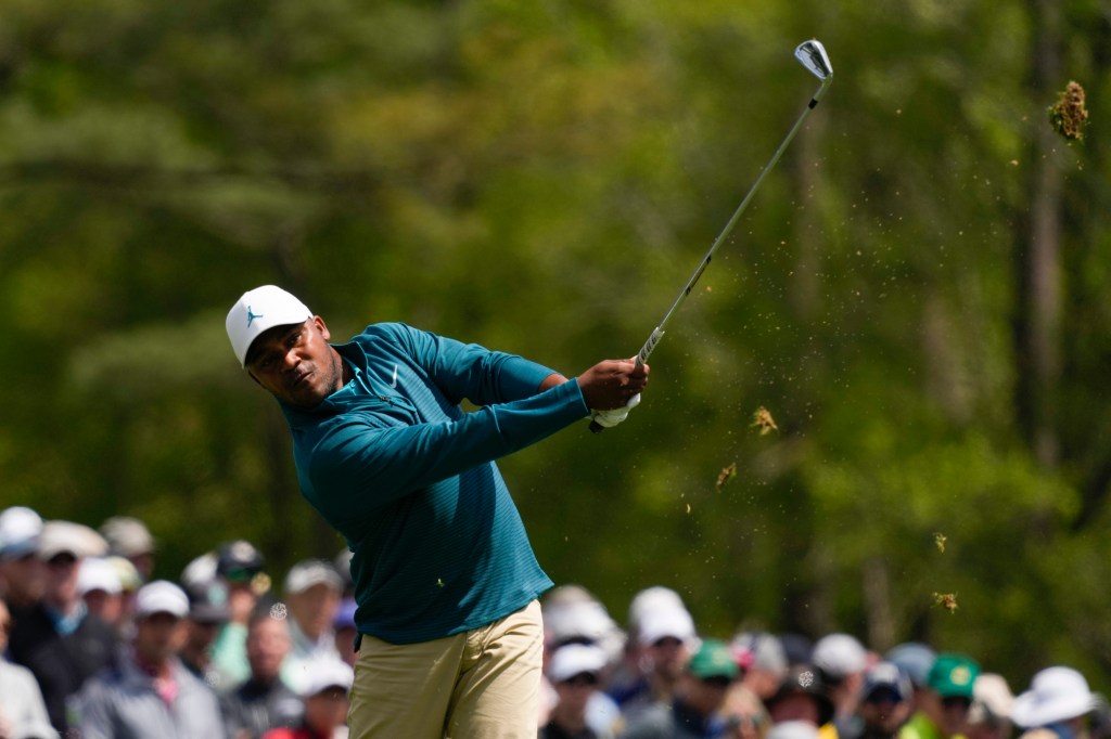 Harold Varner III hits a tee shot on the 12th hole during the second round of the Masters.
