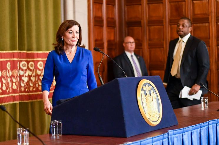 New York Gov. Kathy Hochul arrives to talk about the state budget in the Red Room at the state Capitol Thursday, April 7, 2022.