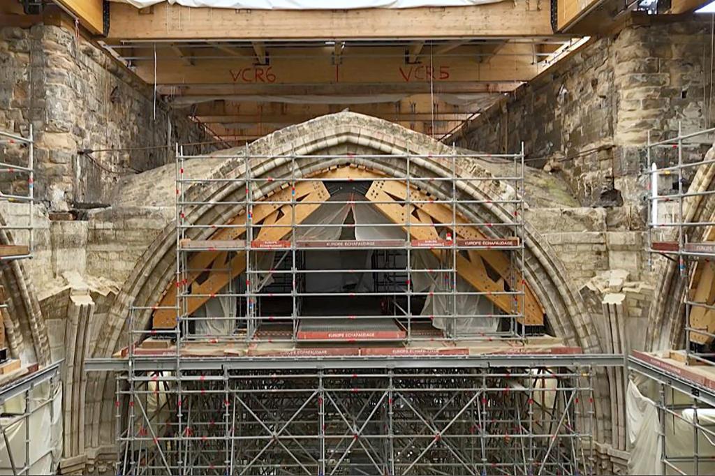 This video grab taken on April 13, 2022, from AFP footage shows scaffolding in Notre-Dame de Paris, after the blaze that made the spire collapsed and destroyed much of the roof on April 15, 2019.