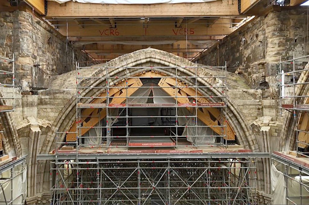 This video grab taken on April 13, 2022, from AFP footage shows scaffolding in Notre-Dame de Paris, after the blaze that made the spire collapsed and destroyed much of the roof on April 15, 2019. 