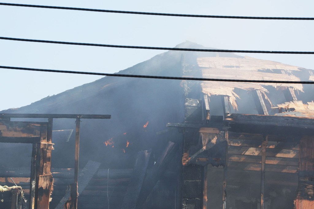 According to fire officials, the structure began to cave in on itself. 