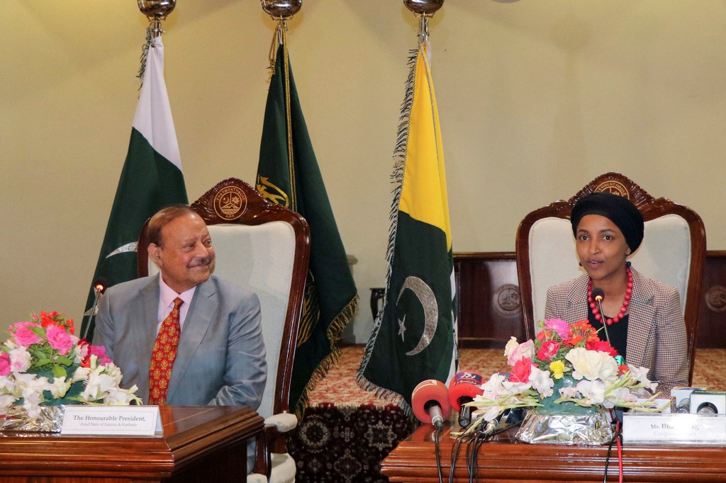 Representative Ilhan Omar, along with the President of Azaz Kashmir Sultan Mehmood Chaudhry, speaks to the media during her visit to Muzaffarabad