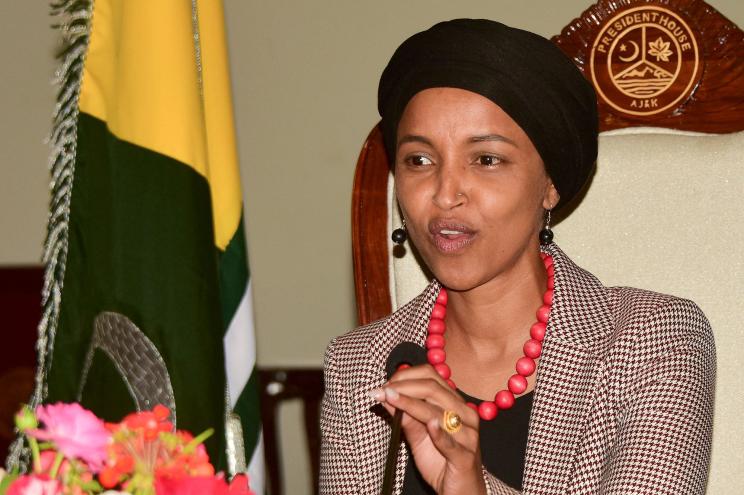 Ilhan Omar speaks next to President of Pakistan-administered Kashmir Sultan Mehmood Chaudhry (not pictured) during a press conference in Muzaffarabad on April 21, 2022.