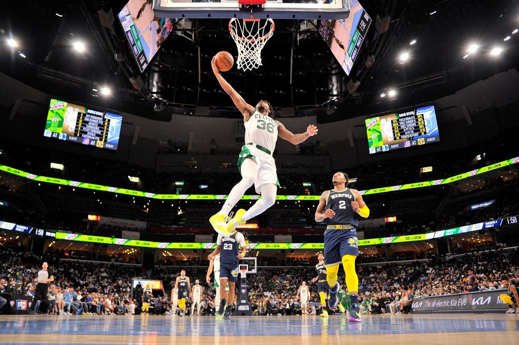 Marcus Smart #36 of the Boston Celtics dunks during the first half  against the Memphis Grizzlies. 