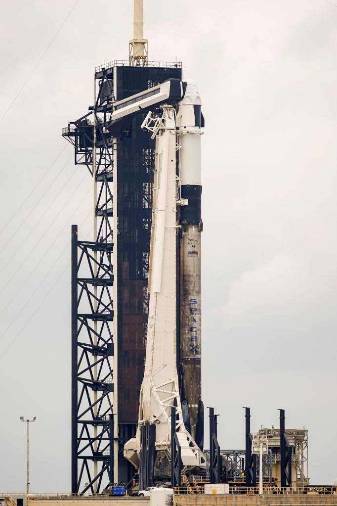 A SpaceX Falcon 9 rocket stands ready on pad 39A at the Kennedy Space Center in Cape Canaveral, Fla.