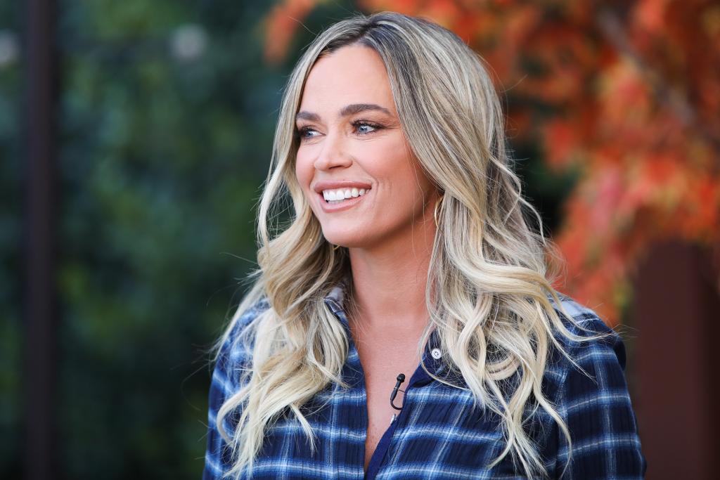 Teddi Mellencamp in a blue flannel.