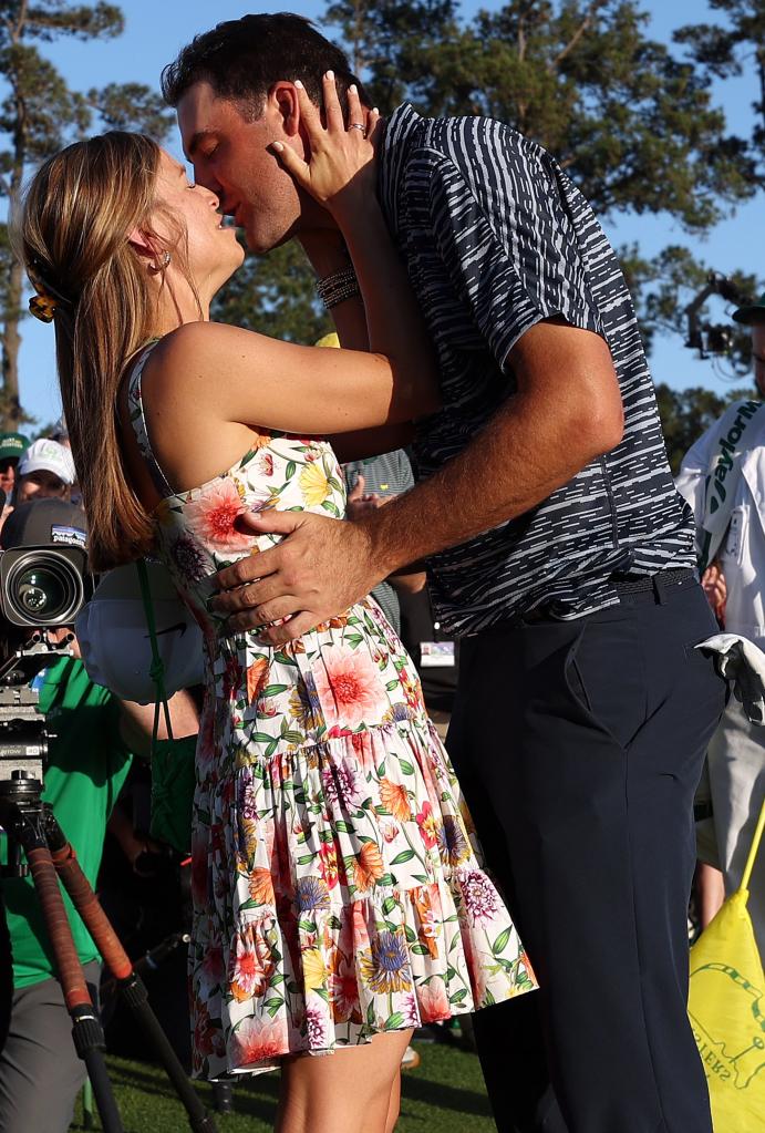 Meredith Scudder kisses husband Scottie Scheffler following his 2022 Masters win on April 10, 2022