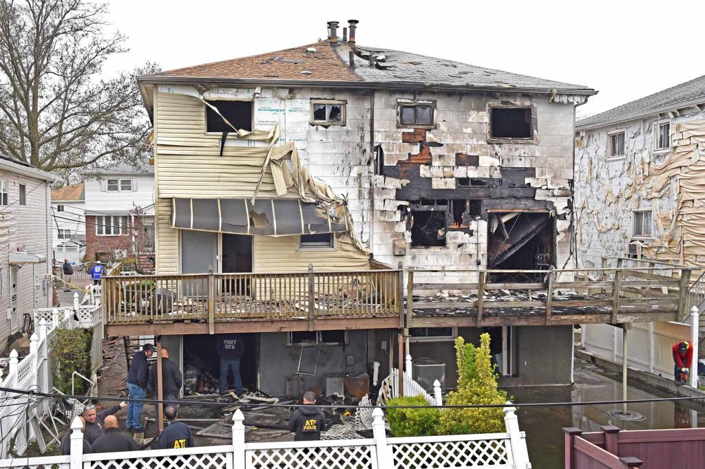 Fire officials say smoke-eaters were battling the fire when flames suddenly swept through the second floor of the building, sending them leaping from windows.