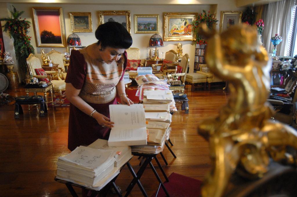 Marcos pictured in her lavish apartment.