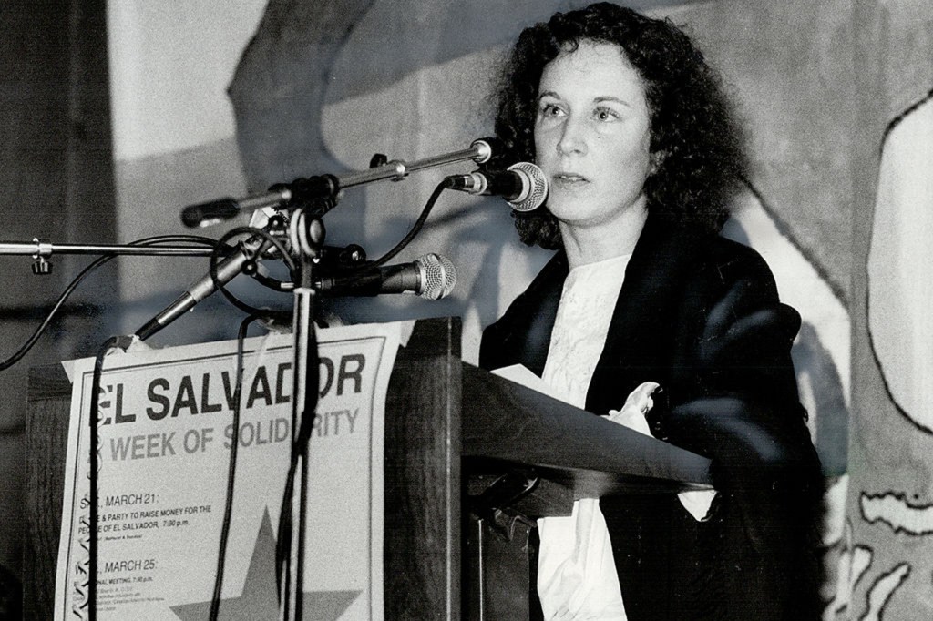 Author-poet Margaret Atwood reads one of three poems she presented at a rally of about 300 people condemning United States intervention in El Salvador.