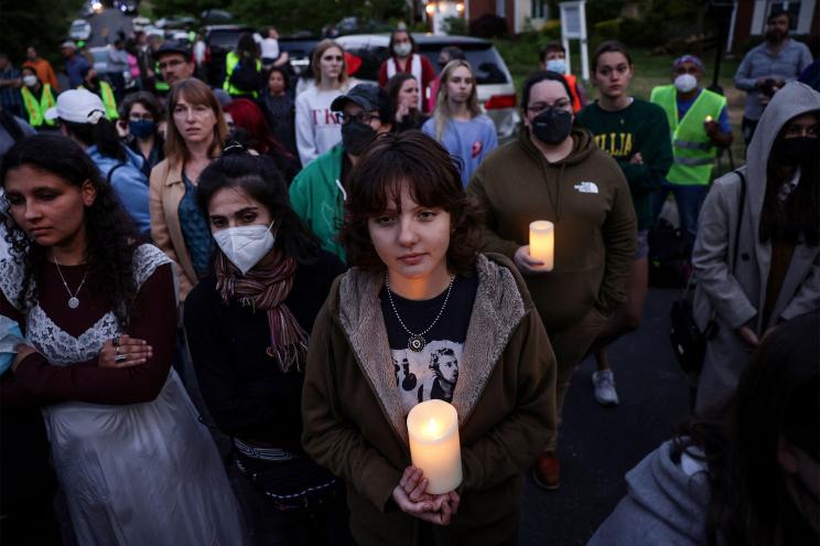 Demonstrators in support of reproductive rights hold a vigil outside Supreme Court Justice Samuel Alito's home in Alexandria, Virginia.