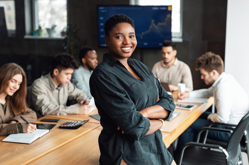 Woman smiling with business people in the background