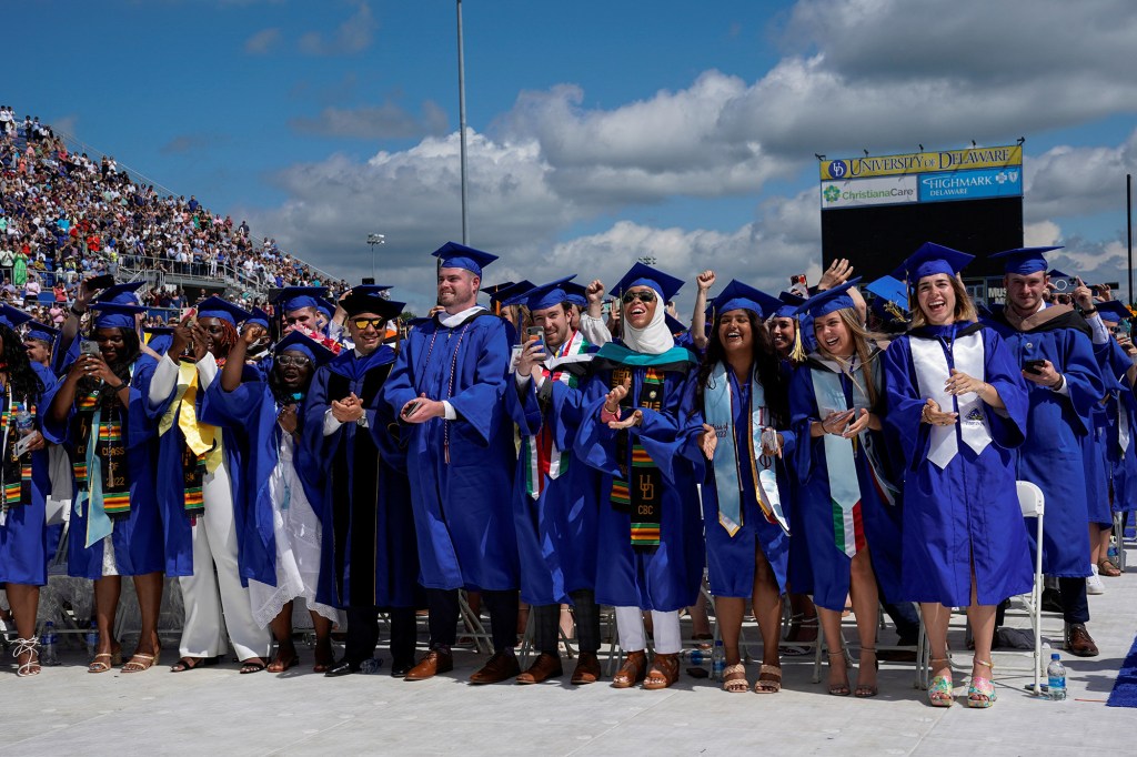 Students react as Biden takes the stage.