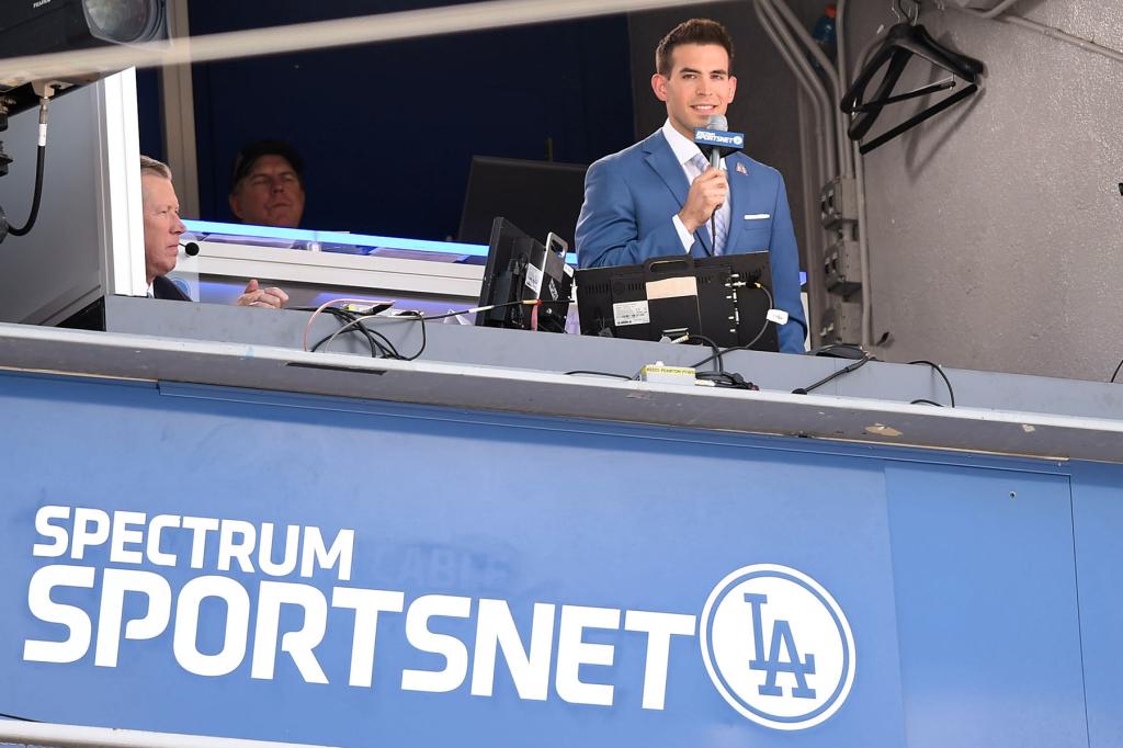 Dodger play-by-play announcer, Joe Davis, addresses the crowd during an MLB opening day game between the San Diego Padres and the Los Angeles Dodgers on April 03, 2017, at Dodger Stadium in Los Angeles, CA.