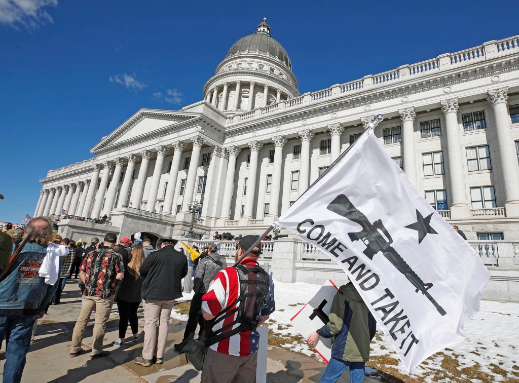 People gather in protest to new gun legislation at the Utah State Capitol in Salt Lake City, Utah on February 8,  2020.