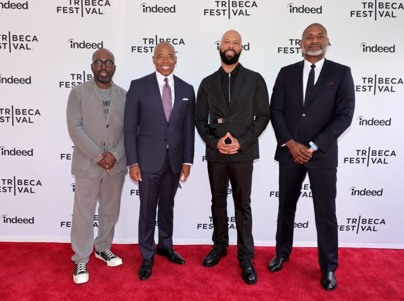 Mayor Eric Adams poses with Derrick Adams, Common and Charles Blow at The Harry Belafonte Voices For Social Justice Award during the 2022 Tribeca Film Festival on June 15, 2022.