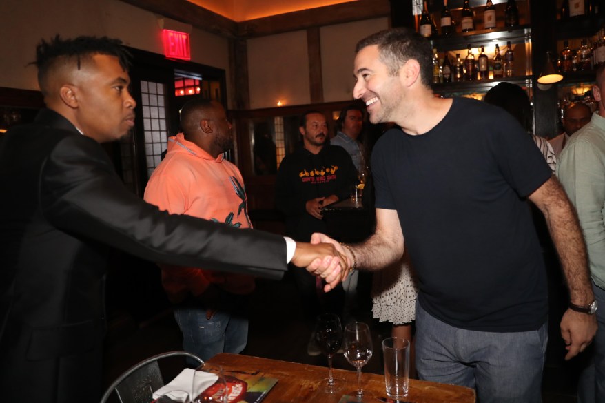 Nas and Ari Melber attend the "Supreme Team" documentary premiere during the 2022 Tribeca Festival at BMCC Tribeca PAC on June 19, 2022