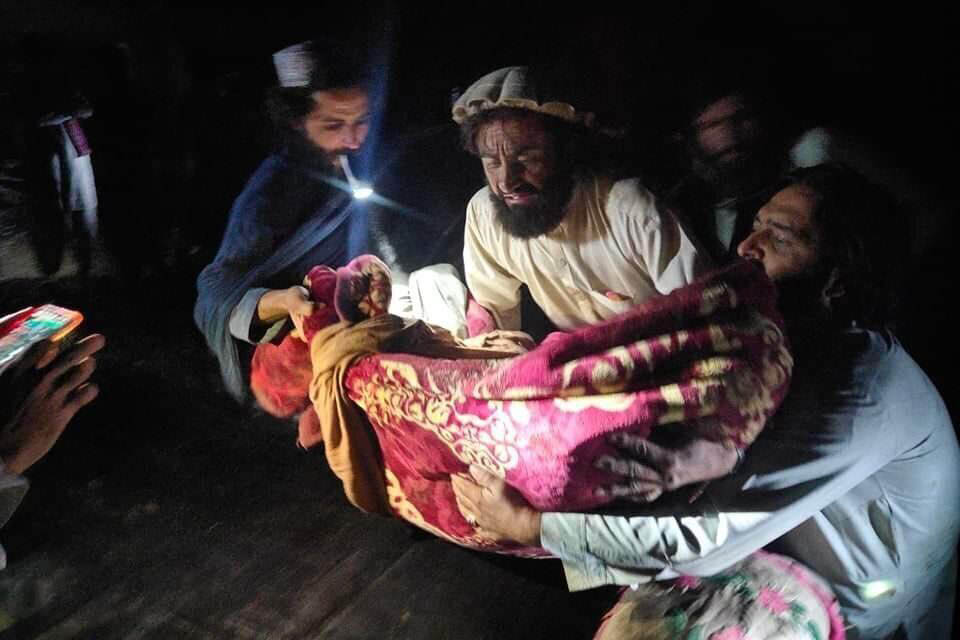 Afghans evacuate wounded in an earthquake in the province of Paktika, eastern Afghanistan.