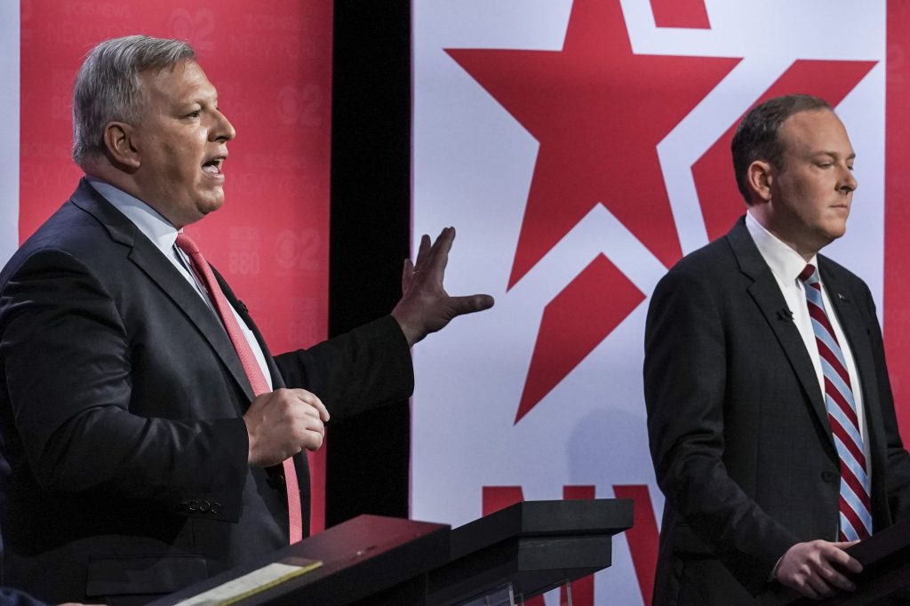 Businessman Harry Wilson, left, rebutts Suffolk County Congressman Lee Zeldin,