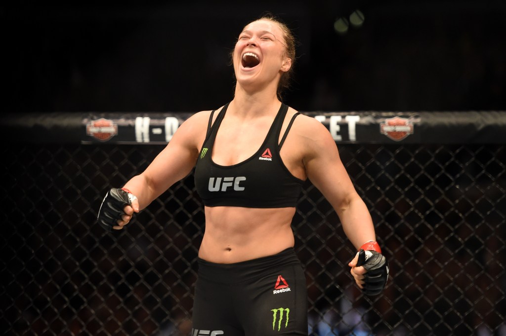 Ronda Rousey celebrates her victory over Cat Zingano in 2015.