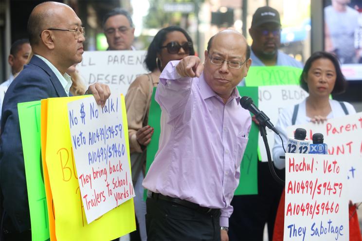 Parents and community members protest outside NY State Governor Kathy Hochul's Manhattan, NY office on June 10, 2022, because the New York State Legislature's introduced a bill to modify the Mayor's control of New York City public schools.