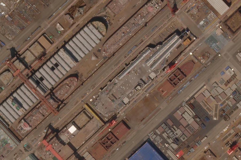 This satellite image from Planet Labs PBC shows construction of China's Type 003 aircraft carrier at the Jiangnan Shipyard northeast of Shanghai, China, May 8, 2022.