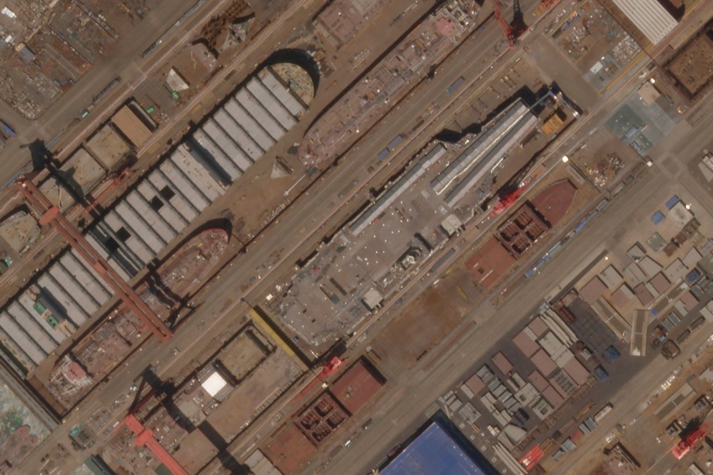 This satellite image from Planet Labs PBC shows construction of China's Type 003 aircraft carrier at the Jiangnan Shipyard northeast of Shanghai, China, May 8, 2022.  