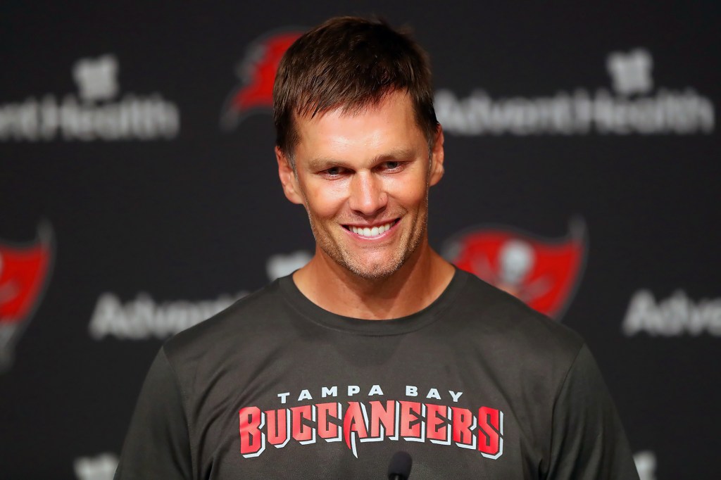 TAMPA, FL - JUN 09: Tampa Bay Buccaneers quarterback Tom Brady (12) speaks to the media after the Tampa Bay Buccaneers Minicamp on June 09, 2022 at the AdventHealth Training Center at One Buccaneer Place in Tampa, Florida. (Photo by Cliff Welch/Icon Sportswire via Getty Images)