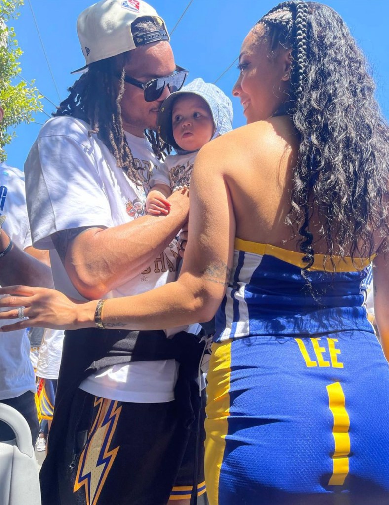 Sydel Curry celebrates the Warriors' NBA Championship win on Monday, June 20, 2022, with husband Damion Lee and their infant son, Daxon Wardell-Xavier Lee.