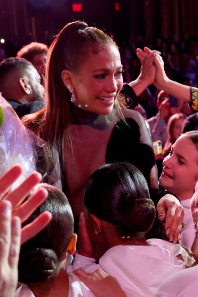 Jennifer Lopez is presented with a bouquet at the premiere of "Halftime" during the Tribeca Film Festival Opening Night on June 8, 2022.