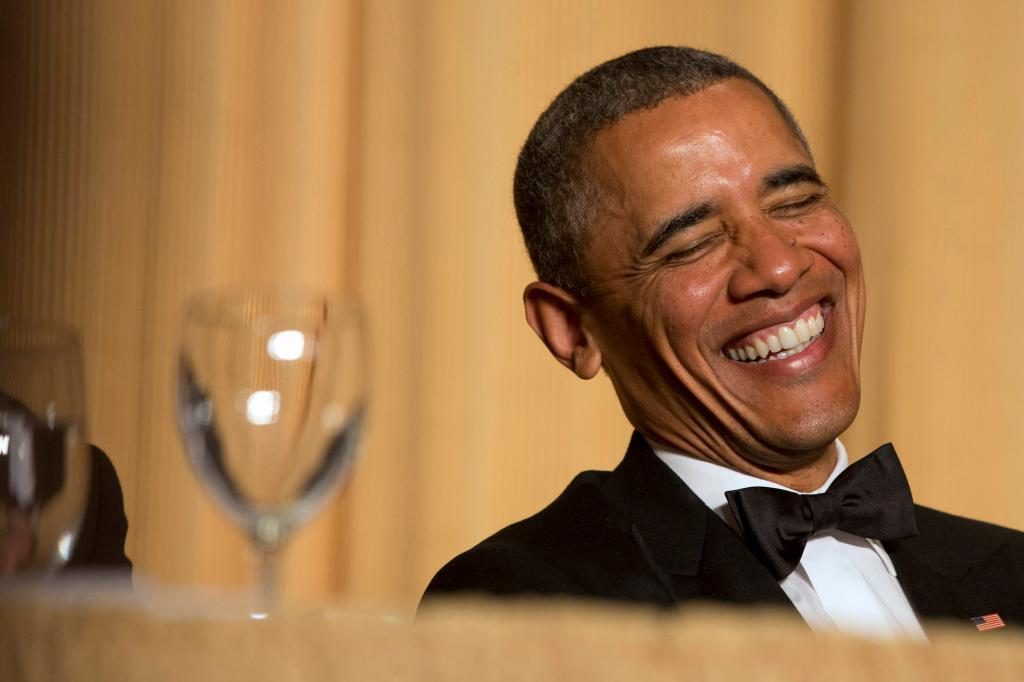 In this May 3, 2014 file photo, President Barack Obama laughs as actor and comedian Joel McHale speaks during the White House Correspondents' Association (WHCA) Dinner at the Washington Hilton Hotel in Washington.