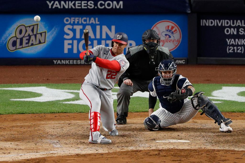 Juan Soto #22 of the Washington Nationals connects on an eighth inning base hit against the New York Yankees at Yankee Stadium on May 07, 2021 in New York City. The Nationals defeated the Yankees 11-4.