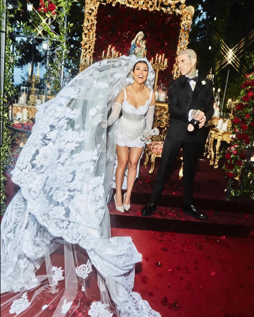 Kourtney and Travis Barker at the altar.