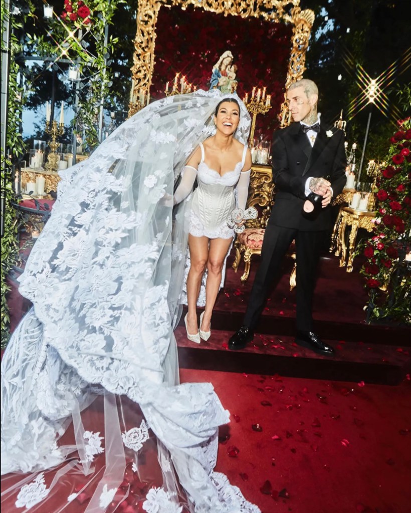 Kourtney and Travis Barker at the altar. 