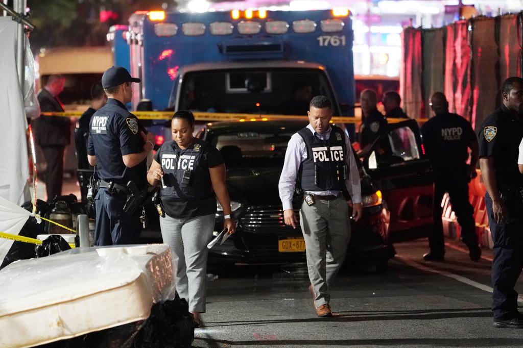 Police at the scene where a person was fatally shot on W124th Street in New York, NY around 12:45 a.m. on July 23, 2022. (Photo/Christopher Sadowski)