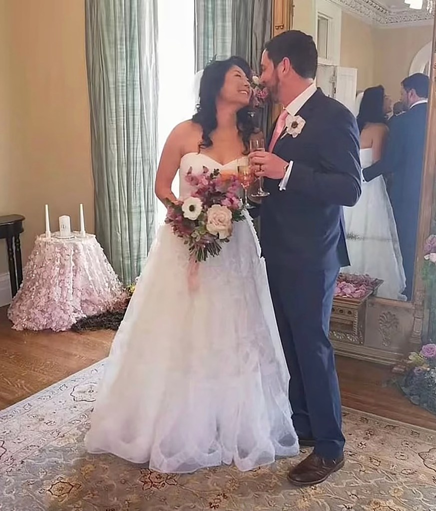 Newlyweds Bradley Robert Dawson and Christe Chen.