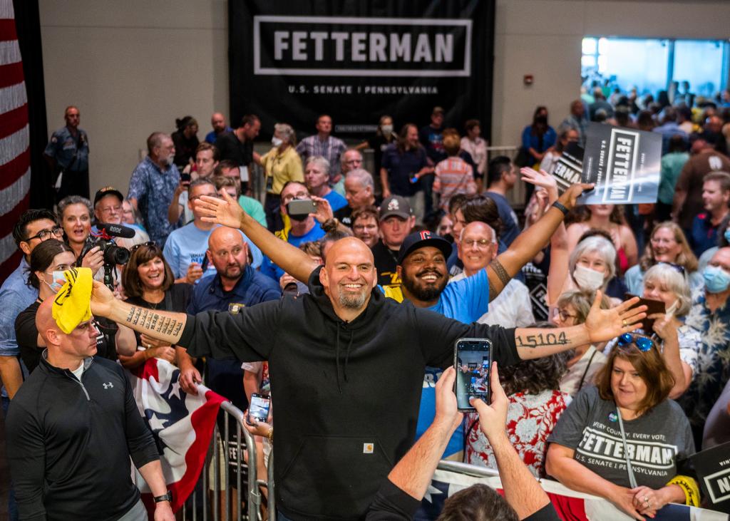 Fetterman takes photos with supporters following a rally at the Bayfront Convention Center in Erie, Pa.