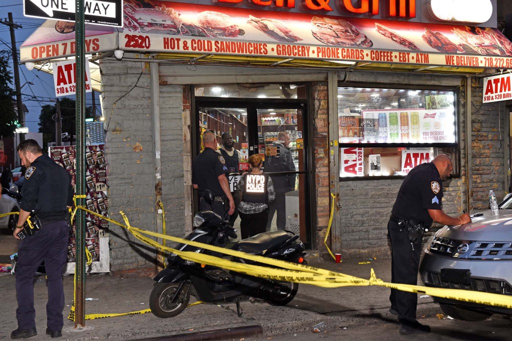 Police investigating a shooting near a deli in Brooklyn on July 27, 2022.