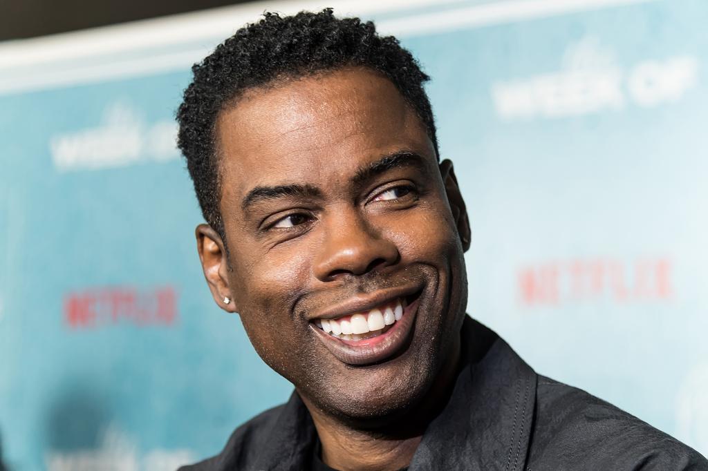 Close up of Chris Rock smiling. 