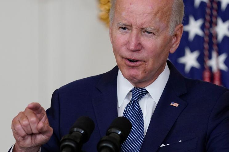 President Joe Biden speaks before signing the Democrats' landmark climate change and health care bill in the State Dining Room of the White House in Washington, Tuesday, Aug. 16, 2022.