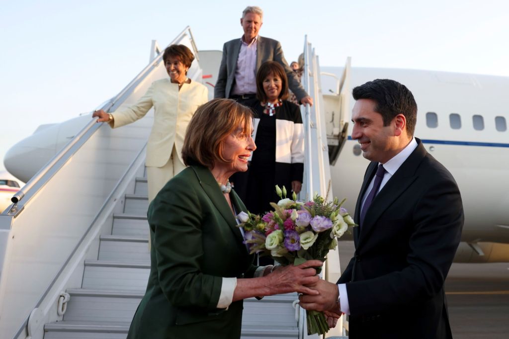 Head of Armenian National Assembly Alen Simonyan, right, welcomes U.S. House of Representatives Nancy Pelosi upon her arrival at the International Airport outside of Yerevan, Armenia.