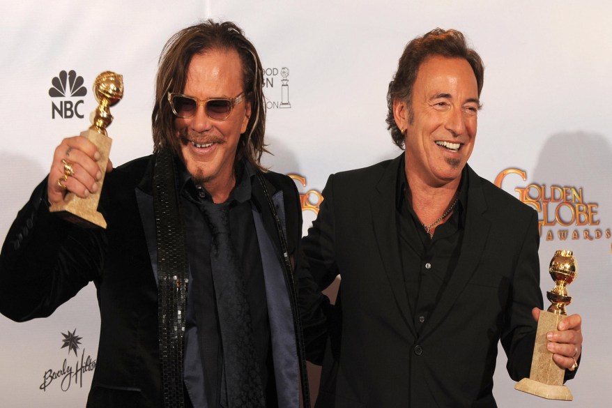 Mickey Rourke (L) poses with his award for Best Performance by an Actor in a Motion picture-Drama in "The Wrestler" with musician Bruce Springsteen winner of Best original Song-Motion Picture for "The Wrestler" in the press room at the 66th Annual Golden Globe Awards held at the Beverly Hilton Hotel on January 11, 2009 in Beverly Hills, California.