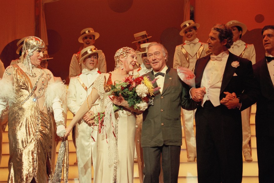 Christopher Plummer surprises Julie Andrews (Center-Left) after Andrews' final performance of "Victor/Victoria" (1997).