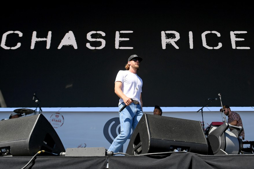 Chase Rice performing early on day 2 of the iHeartRadio Music Festival on September 24, 2022.