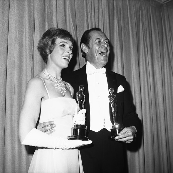 Julie Andrews and Rex Harrison at the 1965 Oscars. Andrews won the best Actress for her role in "Mary Poppins."