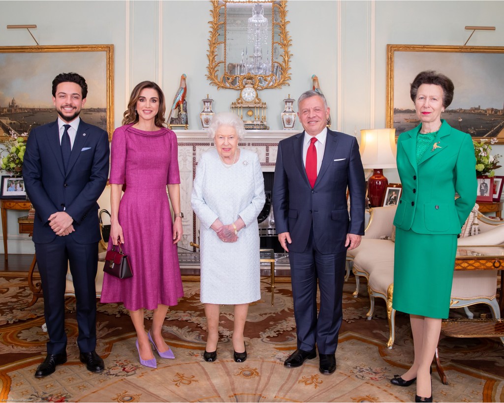 Crown Prince Hussein along with his parents, Queen Rania and King Abdullah, visit with Queen Elizabeth II and her daughter, Princess Anne, at Buckingham Palace in 2019. The Crown Prince completed much of his early education at England's Royal Military Academy Sandhurst.