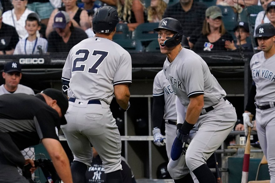 12 - Giancarlo Stanton celebrates with Aaron Judge after after the teammates homered against the Chicago White Sox May 13.