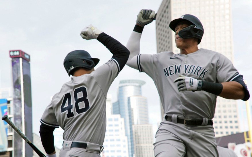 22 - New York Yankees' Aaron Judge, right, and Anthony Rizzo celebrate a two-run home run by Judge off Minnesota Twins pitcher Cole Sands Tuesday, June 7.